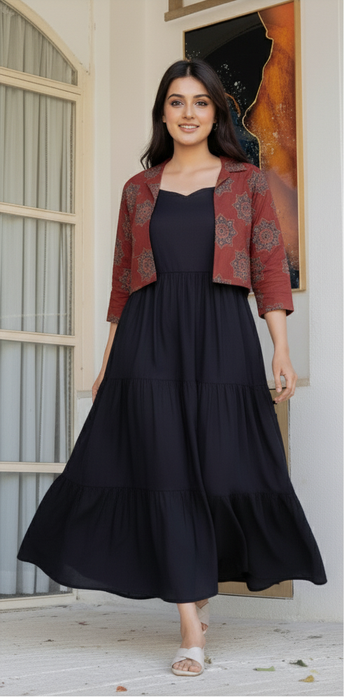 Woman wearing a black dress with a red patterned jacket in two different settings.