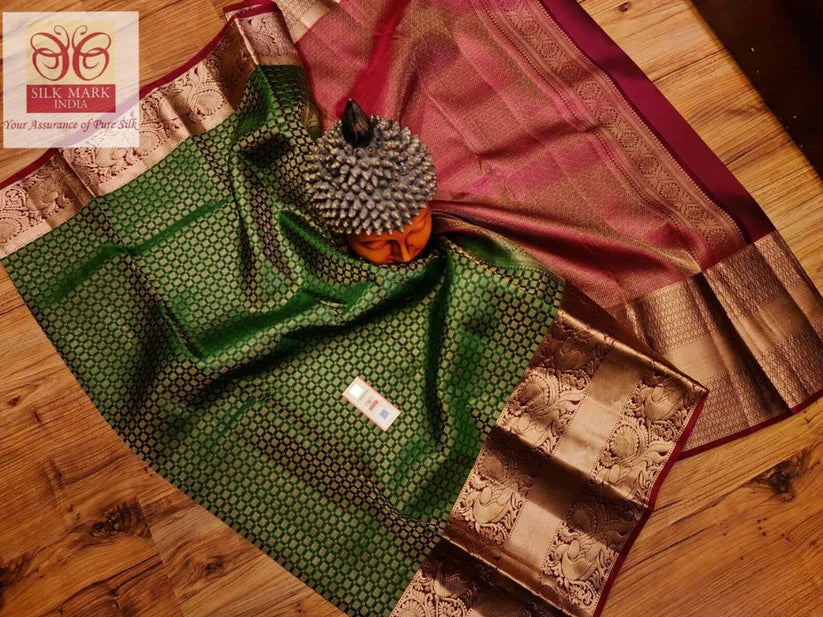Woman in a traditional saree with floral decorations and temple background