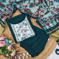 Floral-patterned swimsuit with matching cover-up on a woven surface