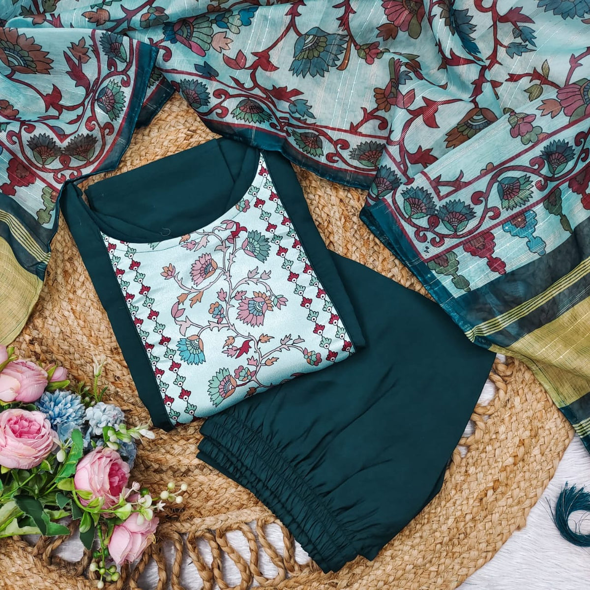 Floral-patterned swimsuit with matching cover-up on a woven surface