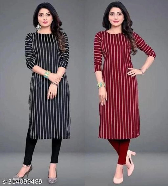 Two women wearing black and red striped kurtis on a gray background
