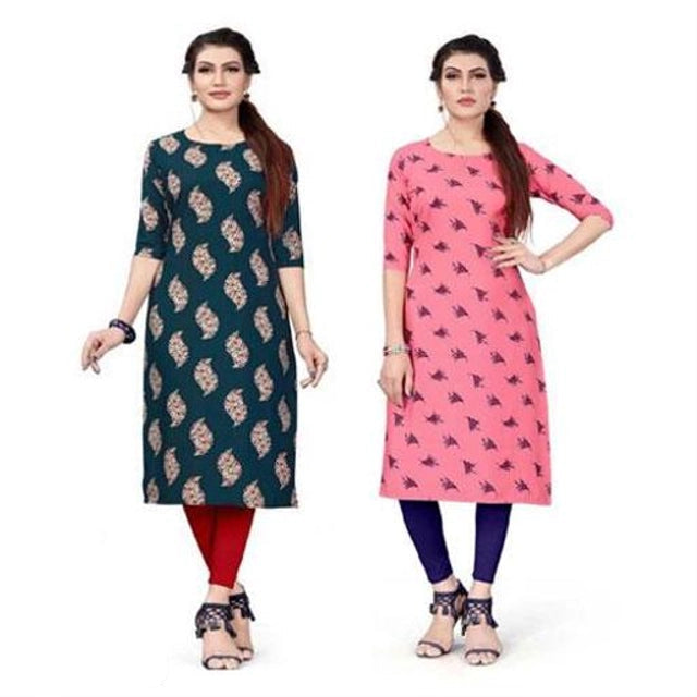 Two women wearing printed kurtis on a white background