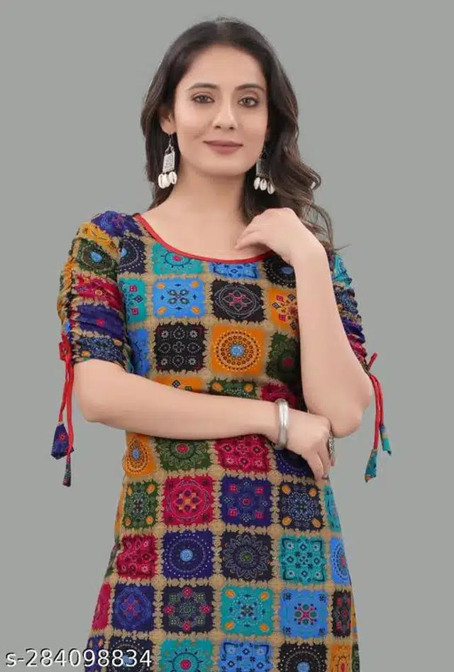 Woman wearing a colorful patterned dress on a gray background