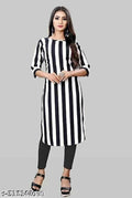 Woman wearing a black and white striped kurta on a gray background