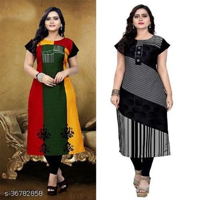 Two women wearing different color combinations of kurtis with a plain background.