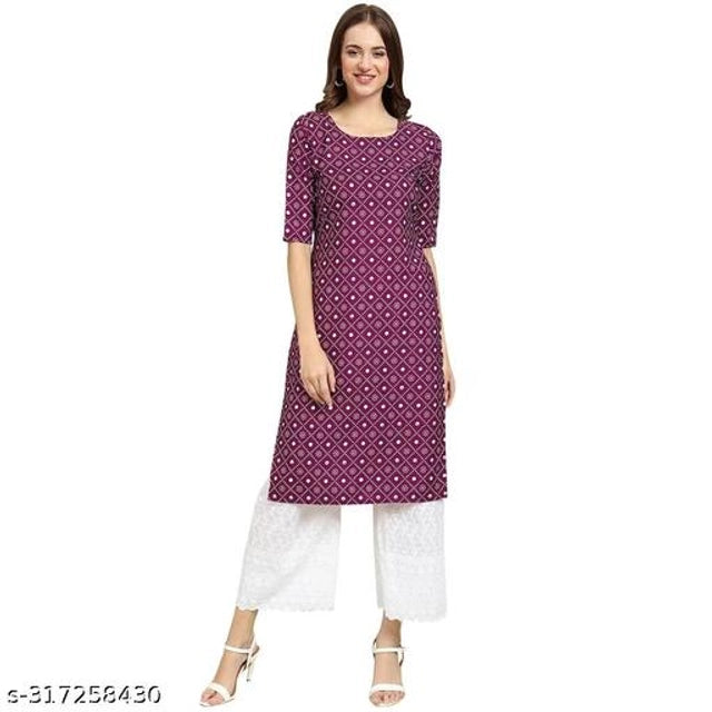 Woman wearing a purple patterned kurta with white pants on a white background
