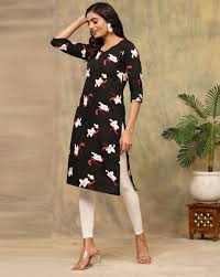 Two floral-patterned kurtis worn by a model on a beige background